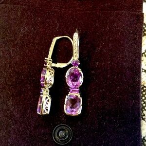 Sterling silver purple and white stone earrings.
